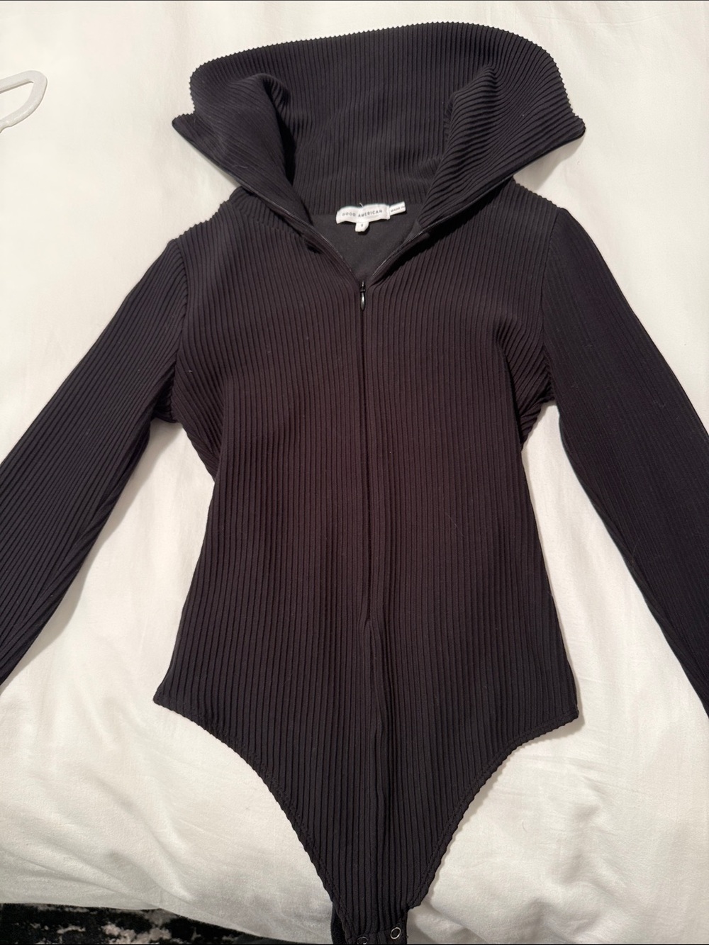 Good American Black Ribbed Hooded Zip-Front Bodysuit Sweater sleeves also zip